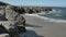 Waves crashing along shoreline in Northern California at Big Sur Monterey area during tide