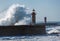 Waves crashing on Lighthouse in Foz of Douro