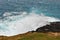 Waves crashing in a natural blowhole on the Australian coast