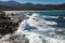 Waves crashing onto rocks near Algajola beach in Corsica