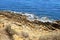 Waves crashing onto the rocky beach near Albufeira