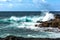 Waves crashing on the rock at Keoniloa Bay, Kauai, Hawaii