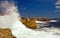 Waves crashing on rocks