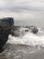 Waves crashing on rocks Old Man`s Beach, Canggu, Bali, Indonesia. B