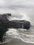 Waves crashing on rocks Old Man`s Beach, Canggu, Bali, Indonesia. B