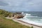 Waves crashing on Sandstone Rocks