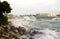 Waves crashing on a seawall.