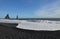 Waves Crashing on the Shore of Reynisfjara Beach with Sea Stacks