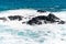 Waves crushing at huge rocks, philip island, victoria, australia