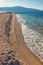 Waves on a deserted beach, surf line. Beautiful Mediterranean landscape on sunny winter day. Montenegro, Kotor Bay