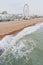 Waves from the English channel sea gently glide to and fro across the famous pebbled beach,during the late winter,Brighton,East