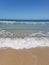 Waves froth on the shore of bribie island