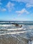 Waves and groynes at the shore