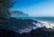 Waves hit rocks at Queens Bath Kauai