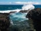 Waves hit rocks at Queens Bath Kauai