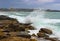 Waves hitting the rocks in Manly beach, Sydney