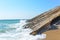 Waves are hitting to rocks at beach in Gokceada, Turkey