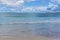 Waves lap the shoreline on Orient Beach in St Martin