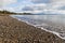 Waves lap up on Llanbedrog beach