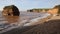 Waves lapping onto Ladram Bay beach Devon England UK