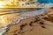 Waves on Miami beach in colorful sunrise, Florida, United States of America