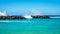 Waves of the Pacific Ocean crashing on the rocks of the barriers at the man made lagoons on the shoreline of Ko Olina