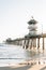 Waves in the Pacific Ocean and the pier in Huntington Beach, Orange County, California