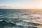 Waves in the Pacific Ocean at sunset, in Encinitas, San Diego County, California