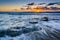 Waves in the Pacific Ocean at sunset, in Laguna Beach