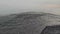 Waves of river and sea water meet at high and low tide. Whirlpool whirlpools of Calabria, Italy.