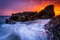 Waves and rocks in the Pacific Ocean at sunset, at Woods Cove