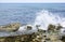 Waves and rocks at Vallcarca beach on the Costa del Garraf, Barcelona