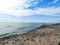 Waves roll into the Ontario shoreline at Sandy Island