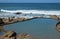 Waves rolling towards tidal pool at Ramsgate, Kwazulu Natal.