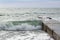 Waves on the sea near the pier overcast