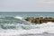 Waves on the sea near the pier overcast