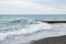 Waves on the sea near the pier overcast