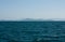 Waves, the sea and some islands in the distance in the Whitsundays in Australia