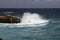 Waves shattering onto rocky Caribbean coast