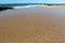 Waves splashing on basalt rocks at Ocean beach Bunbury Western Australia