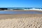 Waves splashing on basalt rocks at Ocean beach Bunbury Western Australia