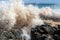 Waves splashing on basalt rocks at Ocean beach Bunbury Western Australia