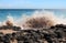 Waves splashing on basalt rocks at Ocean beach Bunbury Western Australia