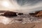 Waves washing onto Ostriconi beach in Balagne region of Corsica