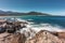 Waves washing onto rocks near Algajola beach in Corsica