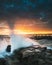 Waves Washing Over Rocks at Sunrise