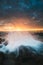 Waves Washing Over Rocks at Sunrise