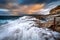 Waves washing up along the rocks of Bare Island