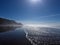 Waves washing up on the beach in Half Moon Bay California