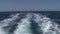 Waves and water surface view from bow luxury white yacht ship in Red Sea.